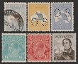 145 · Collection 1913-64 in Seven Seas hingeless albums & hagners inc Kangaroo 1st wmk 5/- M, 3rd wmk &pound;1 Chocolate & dull blue, 6d blue OS MUH, tiny tone spot, KGV single wmk 1/4 Turquoise, SM 13&frac12; x 12&frac12; 1&frac12;d golden scarlet with major variety 'type B re-entry, duplication of shading above right wattles etc, range of 1930 Commemoratives inc 1934 Victoria Centenary (both perfs), Macarthur set etc 1964 Navigators set to &pound;2, 1981 27 Tree Frog with minor misperfs. Mixed MUH/M