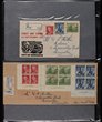 266 · FDC collection 1931-65 in 2 FDC albums inc 1934 1/6 Hermes on 2d KGV Postal Stationery envelope, Registered (cat $575), 1949 5/- Arms & 10/- Arms (cat $450), 1961 5/- Cattle, 1963 4/- & 5/- Navigators. 80% are nice, 20% mostly in 1st album have toning light to heavy, some clean. ACSC cat $3100. (170+ covers)